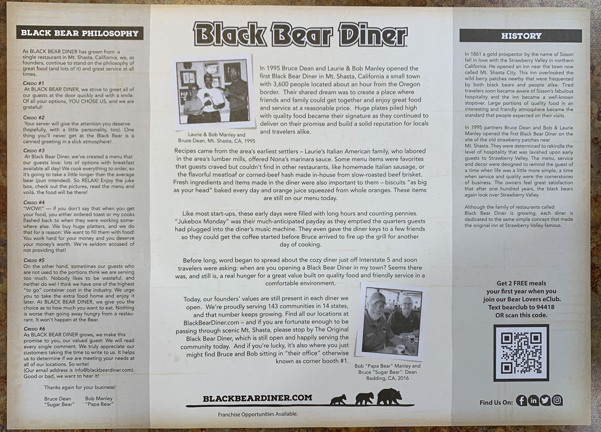 A family restaurant menu with detailed text about Black Bear Diner’s philosophy, history, and founders. Includes a photo of Bruce and Laurie Dean, a QR code, free meals for kids joining the Bear Lovers Club, rustic design, and breakfast highlights.