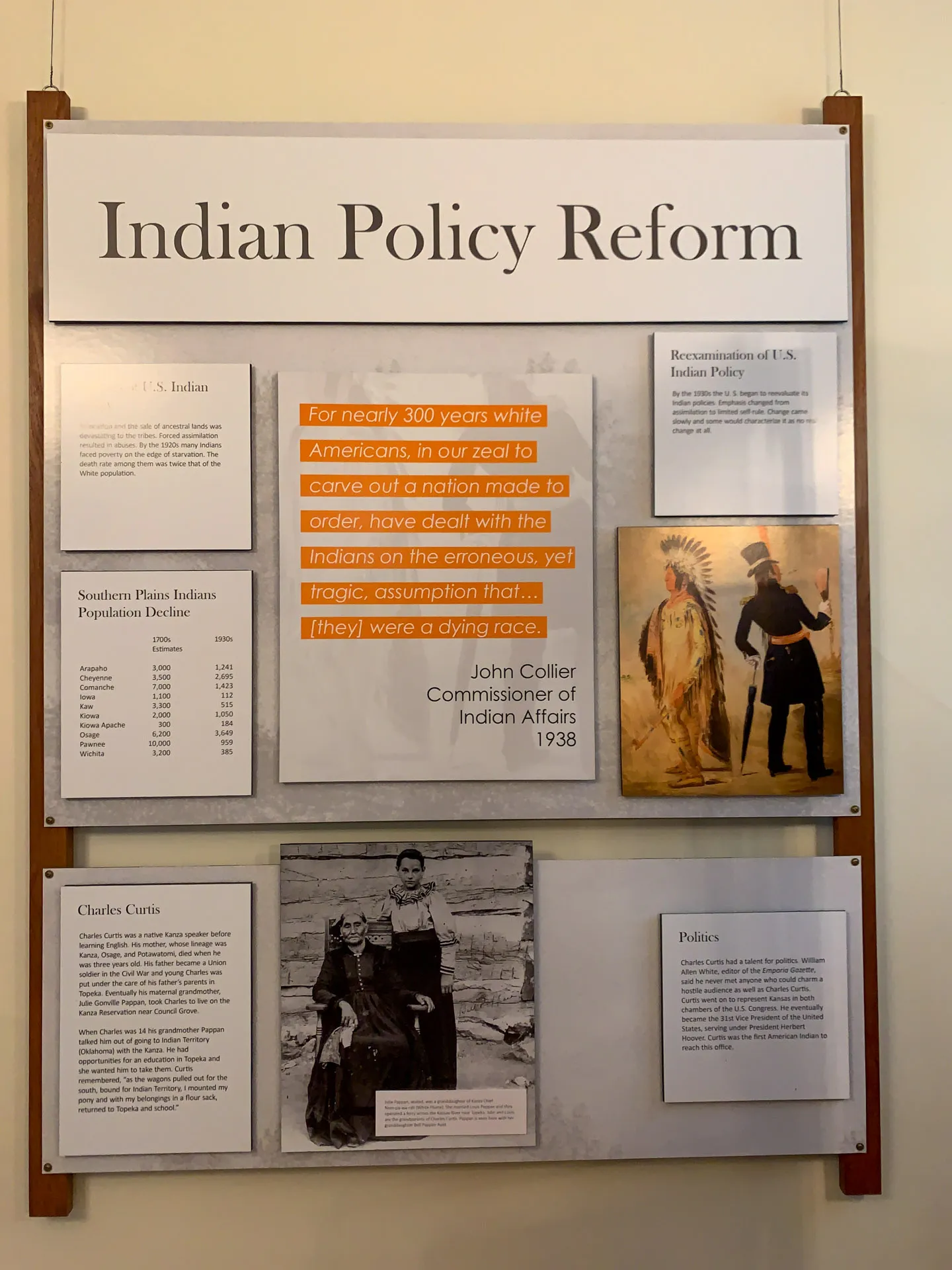 Exhibit panel titled "Indian Policy Reform" featuring historical text, images, and charts. Highlights include a quote from John Collier (1938), a photo of a Native American in traditional attire, a depiction of a man. Contains information about Southern Plains Indian populations.