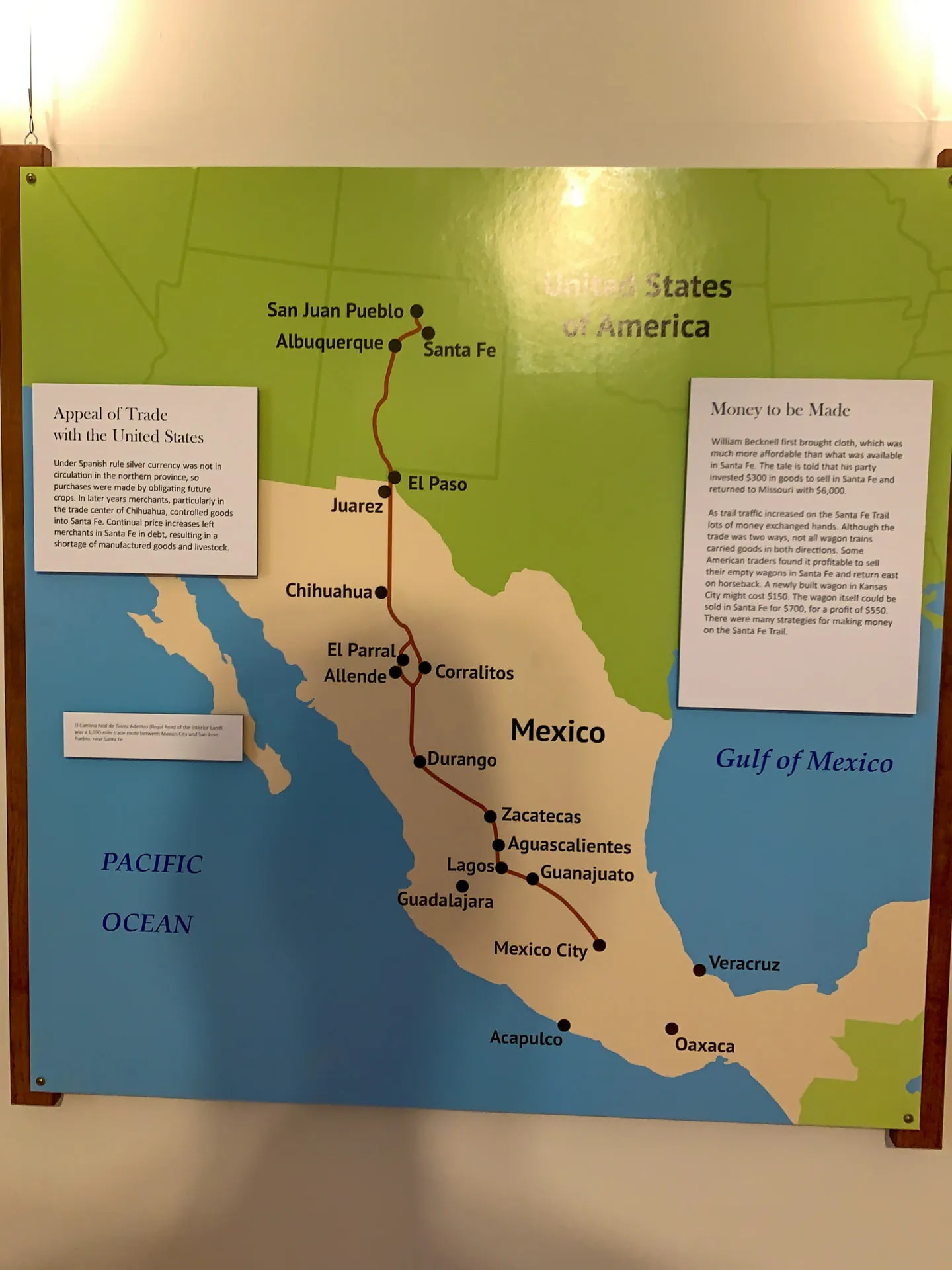 Map illustrating a trade route from Mexico to the United States with stops in major cities like Mexico City, Durango, and Albuquerque. Text boxes titled "Appeal of Trade with the United States" and "Money to be Made" highlight historical trade benefits. Labels for oceans and countries included.