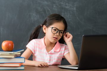 Confused Girl at Computer